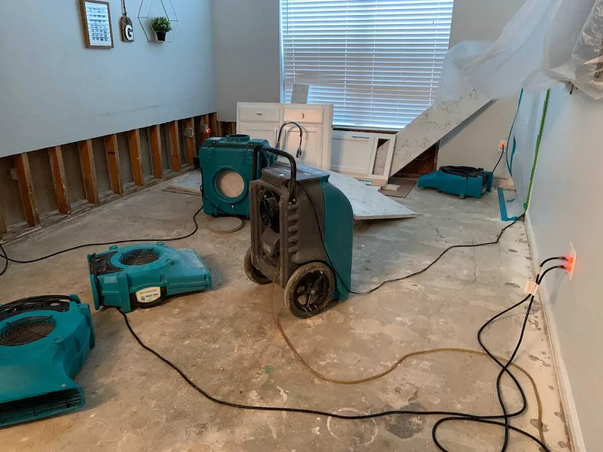 Dehumidifier in flood-cut room for Water Damage Restoration in Sandy Springs
